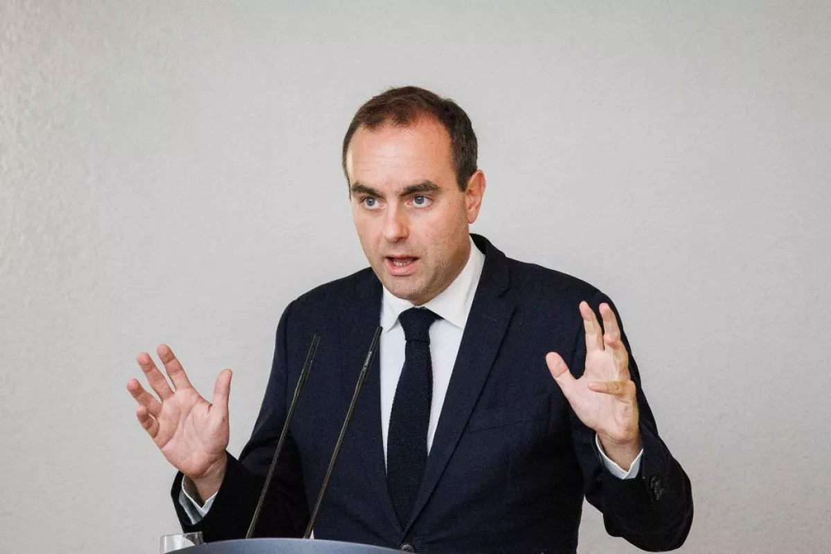 Caretaker French PM says parliament dissolution unlikely after party talks