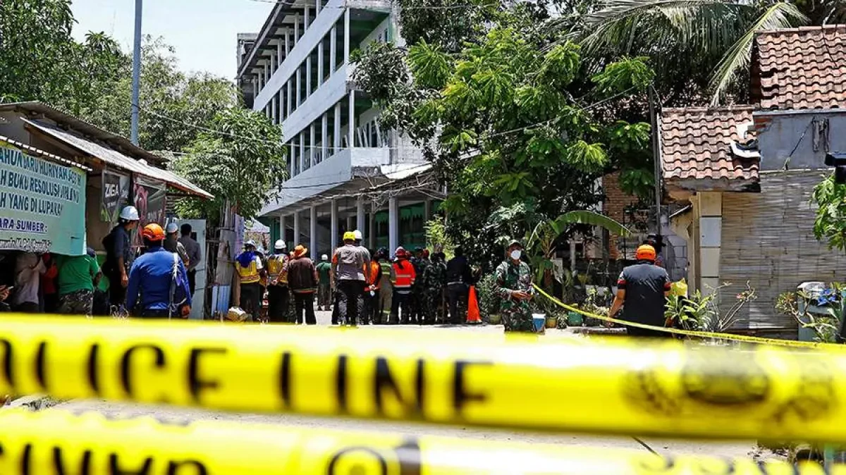 Death toll from Indonesia boarding school collapse rises to 14