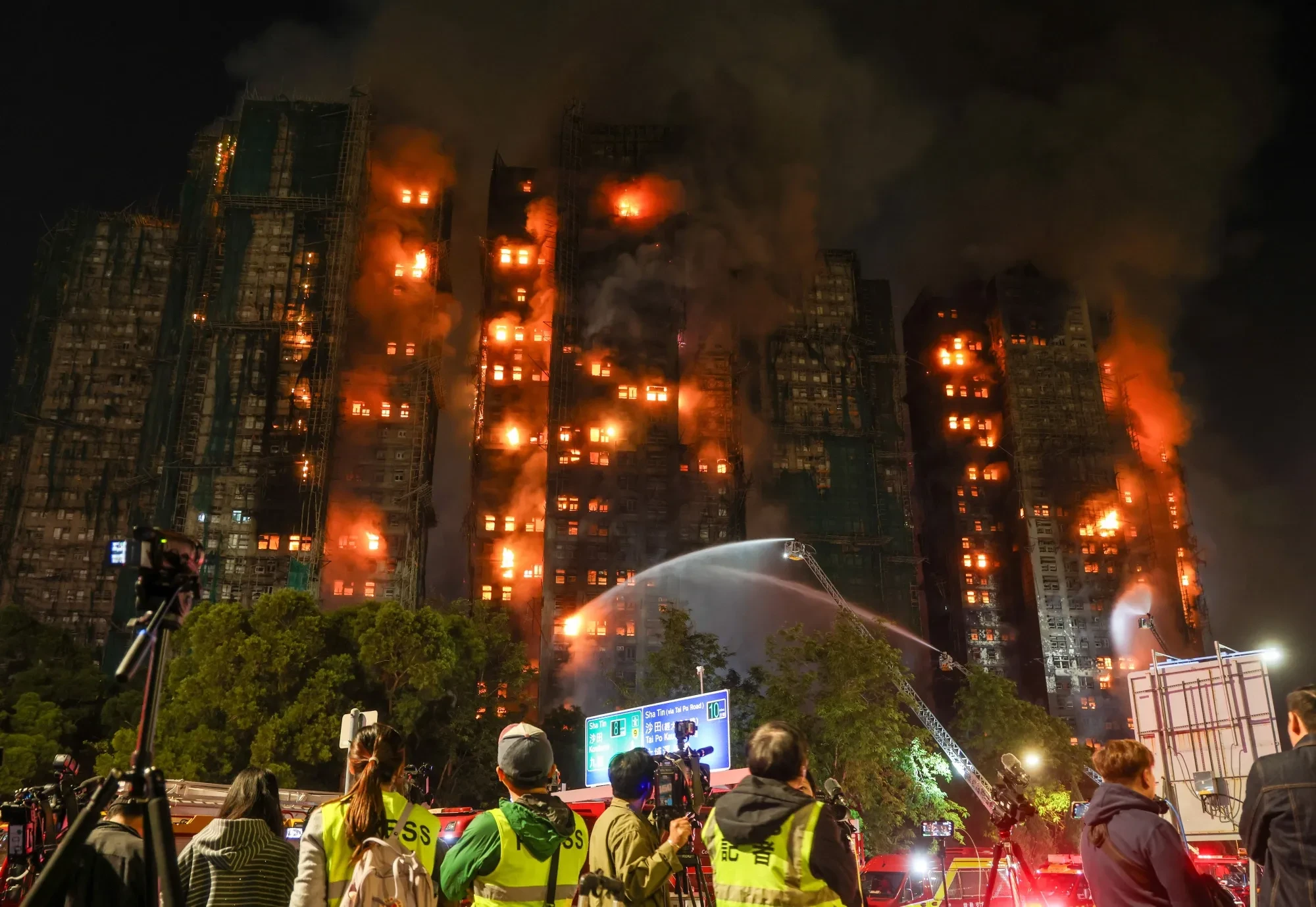 Three arrested after high-rise fire in Hong Kong kills dozens