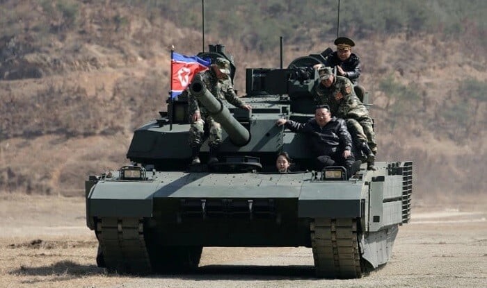 North Korean leader and his daughter ride a tank together