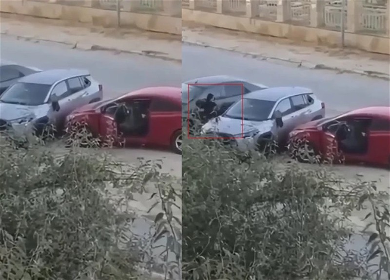 В Баку женщина пыталась разбить припаркованный автомобиль - ВИДЕО