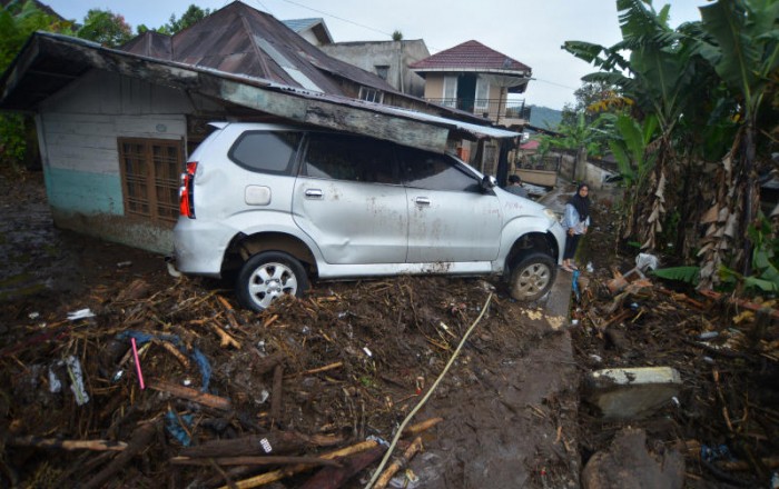 Death toll in Indonesia's lava floods rises to 67 with 20 missing