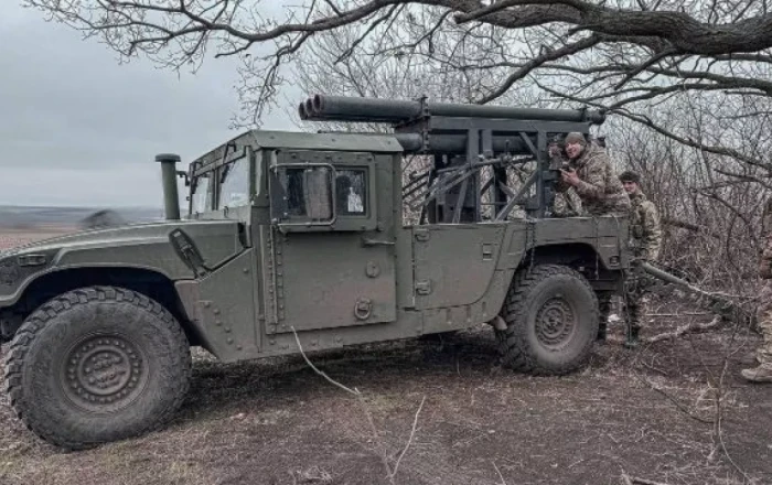 Ukrainian forces adapt US-supplied vehicle into multiple launch rocket system With Soviet BM-21 Grad tubes