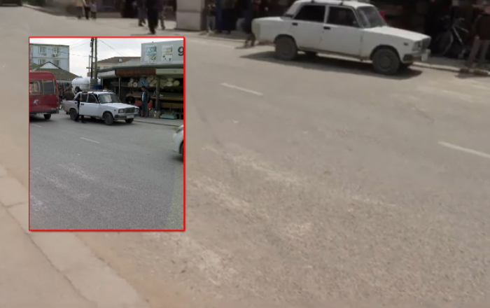 Məktəbin qarşısında piyada zolağı silinib, təhlükəli vəziyyət yaranıb -