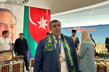Azerbaijani diaspora head declared federally wanted in Russia as son remains in custody