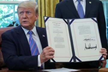 Trump signs tax and spending bill into law
