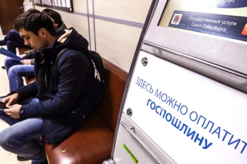 Russia seeks to tighten control with registration fees for migrants