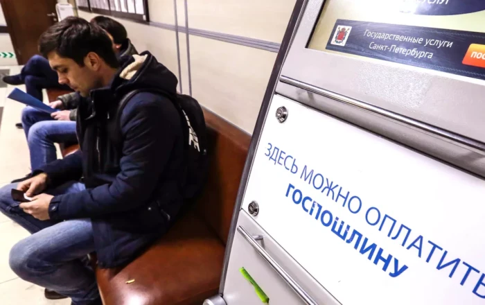 Russia seeks to tighten control with registration fees for migrants