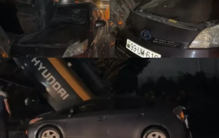 В Азербайджане экскаватор с прицепа опрокинулся на Prius