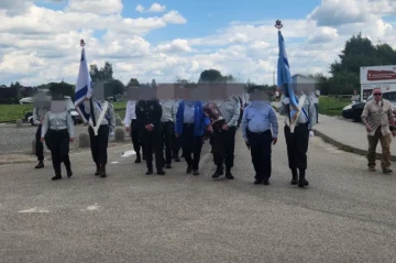 Israeli officers barred from Birkenau with flags in tense stand-off with Polish police