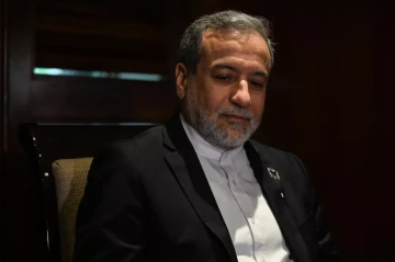 Iran ready to restore nuclear access if Western sanctions lifted, FM says
