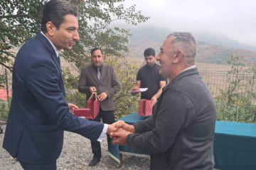 Families resettled in Seyidbayli village of Khojaly receive house keys