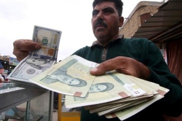 İranda dolların məzənnəsi rekord həddə çatdı
