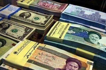 Iran’s currency falls to a new low as sanctions squeeze