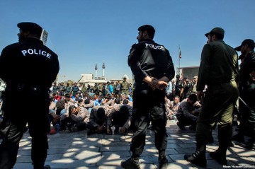 Tehran market strikes spread as rial hits record low