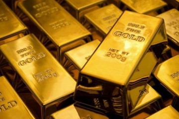 Tarixdə ilk dəfə qızılın unsiyası 4 400 dolları keçib