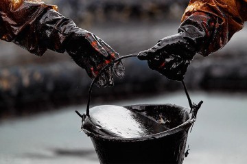 Brent hits $63.34 amid market gains