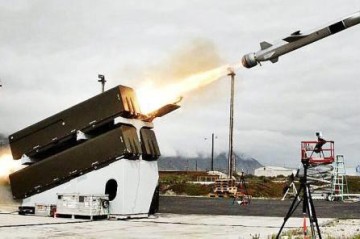 Japan scraps limits on lethal arms exports