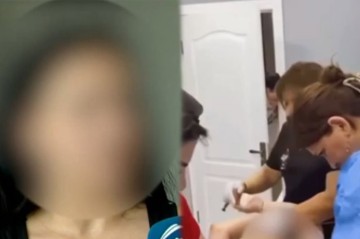 Qapıdan baxan qeydiyyatçı oğlan imiş - Videodakı qadın danışdı