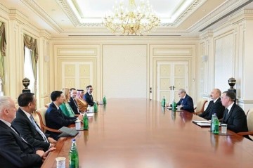 Aliyev receives international financial leaders
