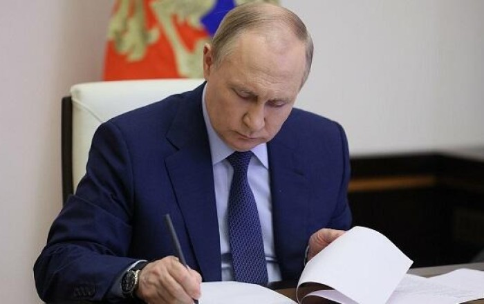 Putin tightens citizenship rules for migrants