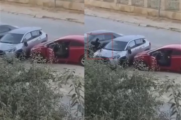 В Баку женщина пыталась разбить припаркованный автомобиль - ВИДЕО