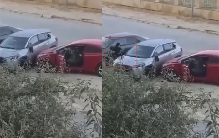 В Баку женщина пыталась разбить припаркованный автомобиль - ВИДЕО