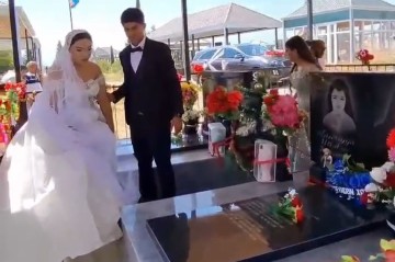 Toy günü faciəvi şəkildə ölən ailə üzvlərinin məzarını ziyarət etdi - VİDEO