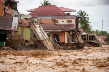 Floods and landslides in Indonesia's Sumatra kill at least 174