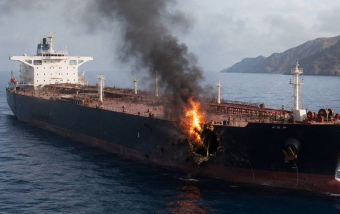 Oman says attacked oil tanker towed to port, 2 crew members missing